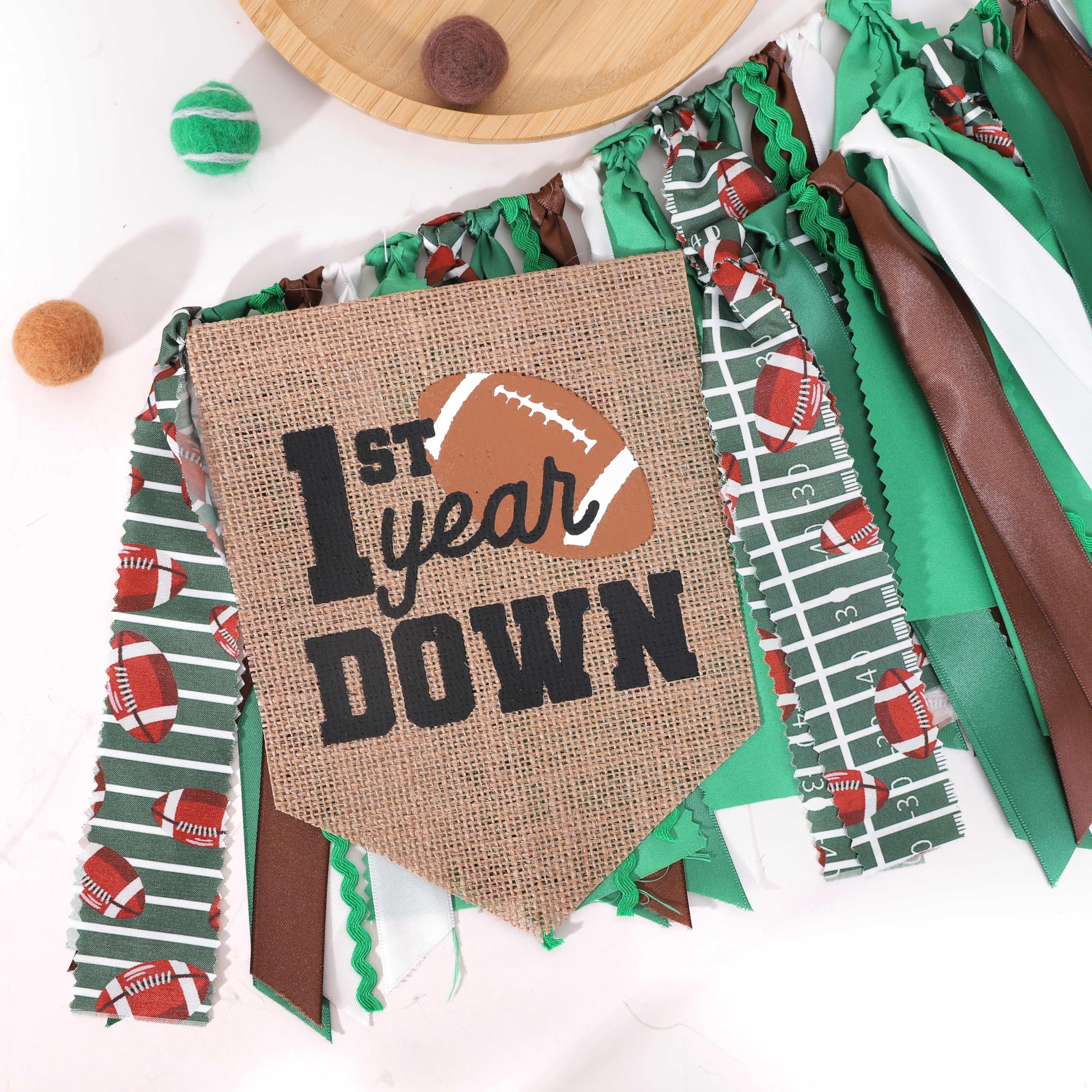 TUTOTU football banner complements boy's birthday decor and memories