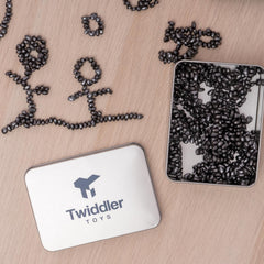 Twiddler Toys Magnetic Putty Pebbles stored in drawstring bag for portable relief