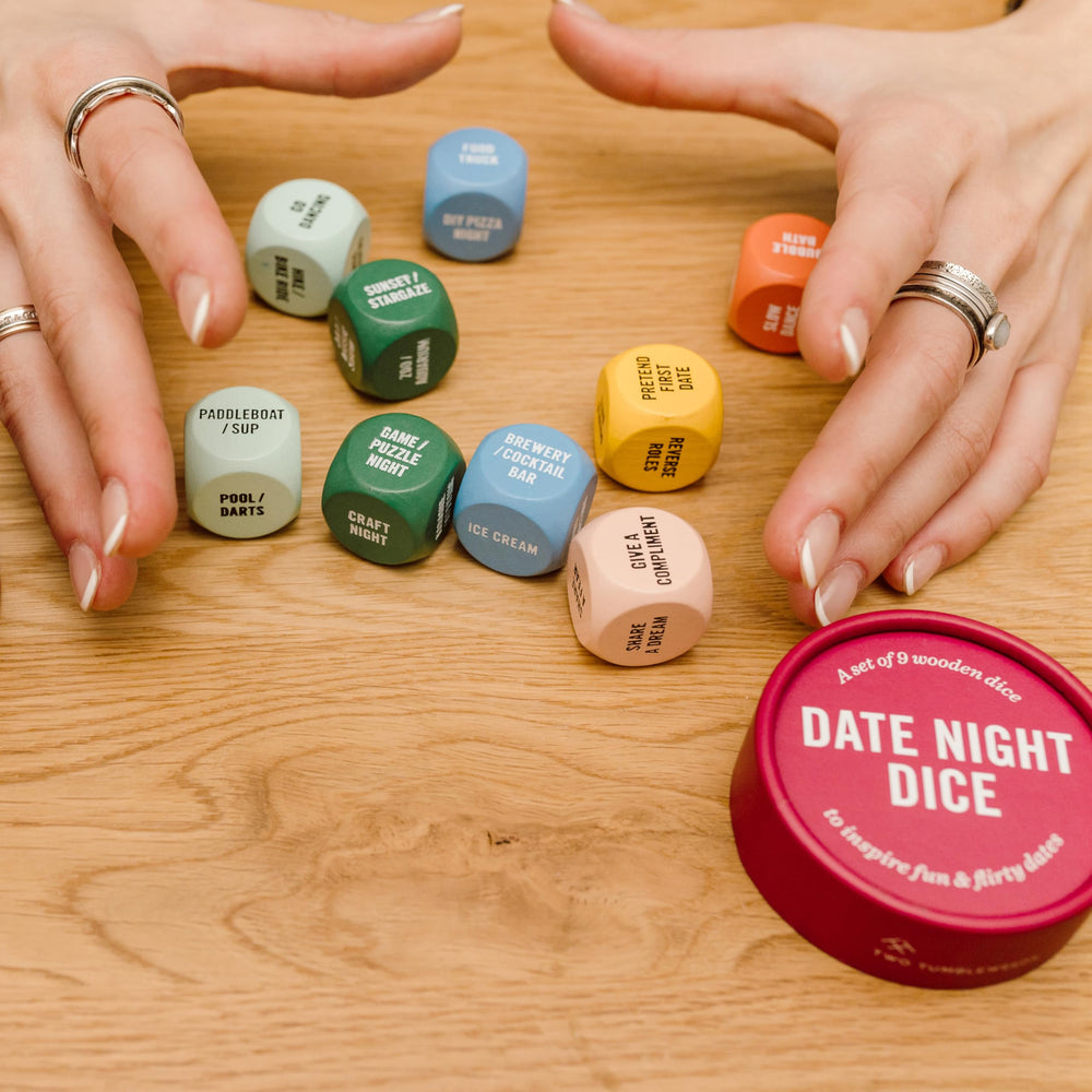Two Tumbleweeds dice sit on a coffee table ready for a date night
