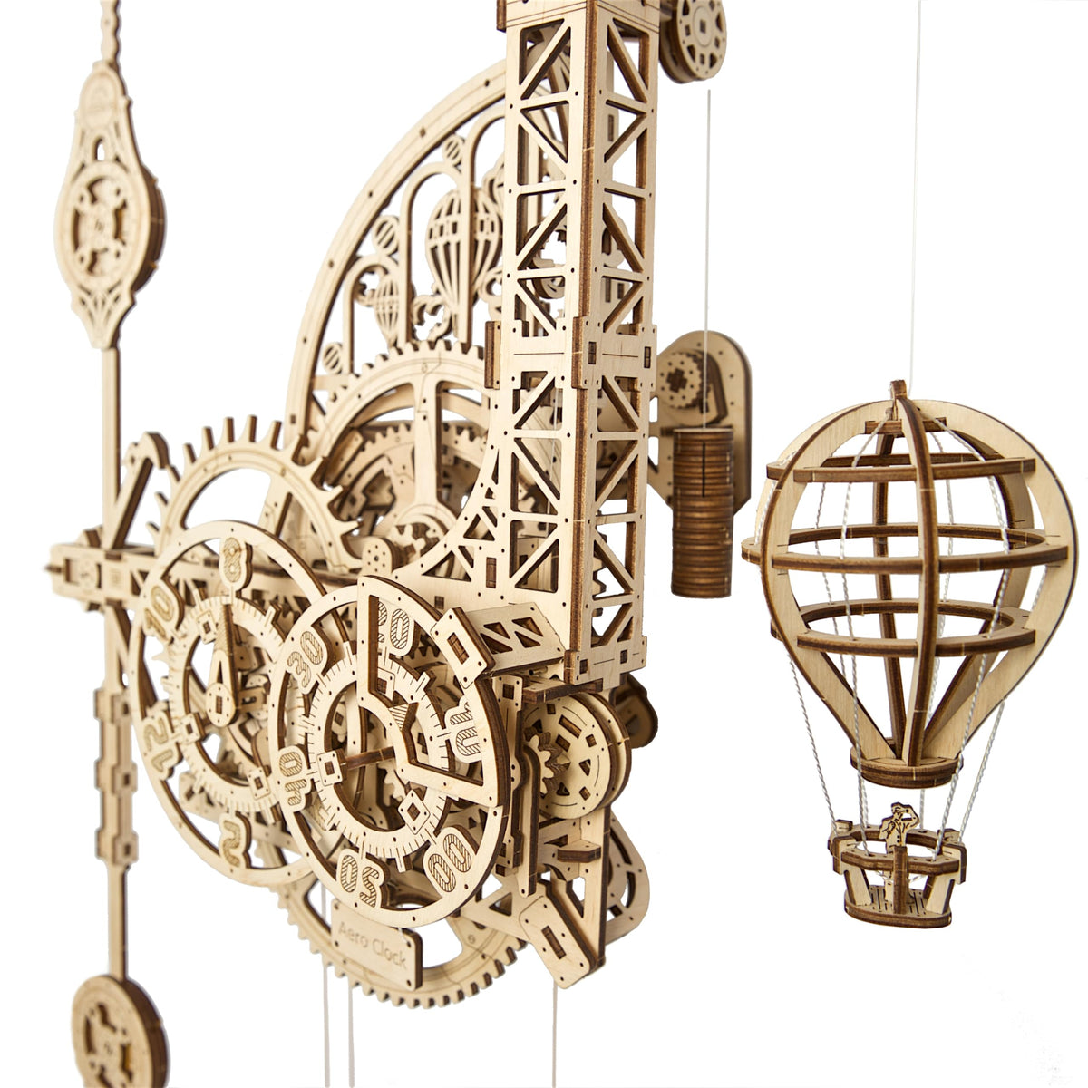 UGEARS Aero Clock packaging with wooden parts ready for assembly.