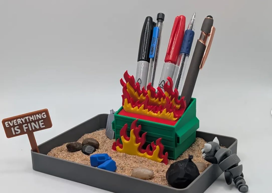 UglaForge Dumpster Fire Zen Garden arranged with simple stones, calming workspace.