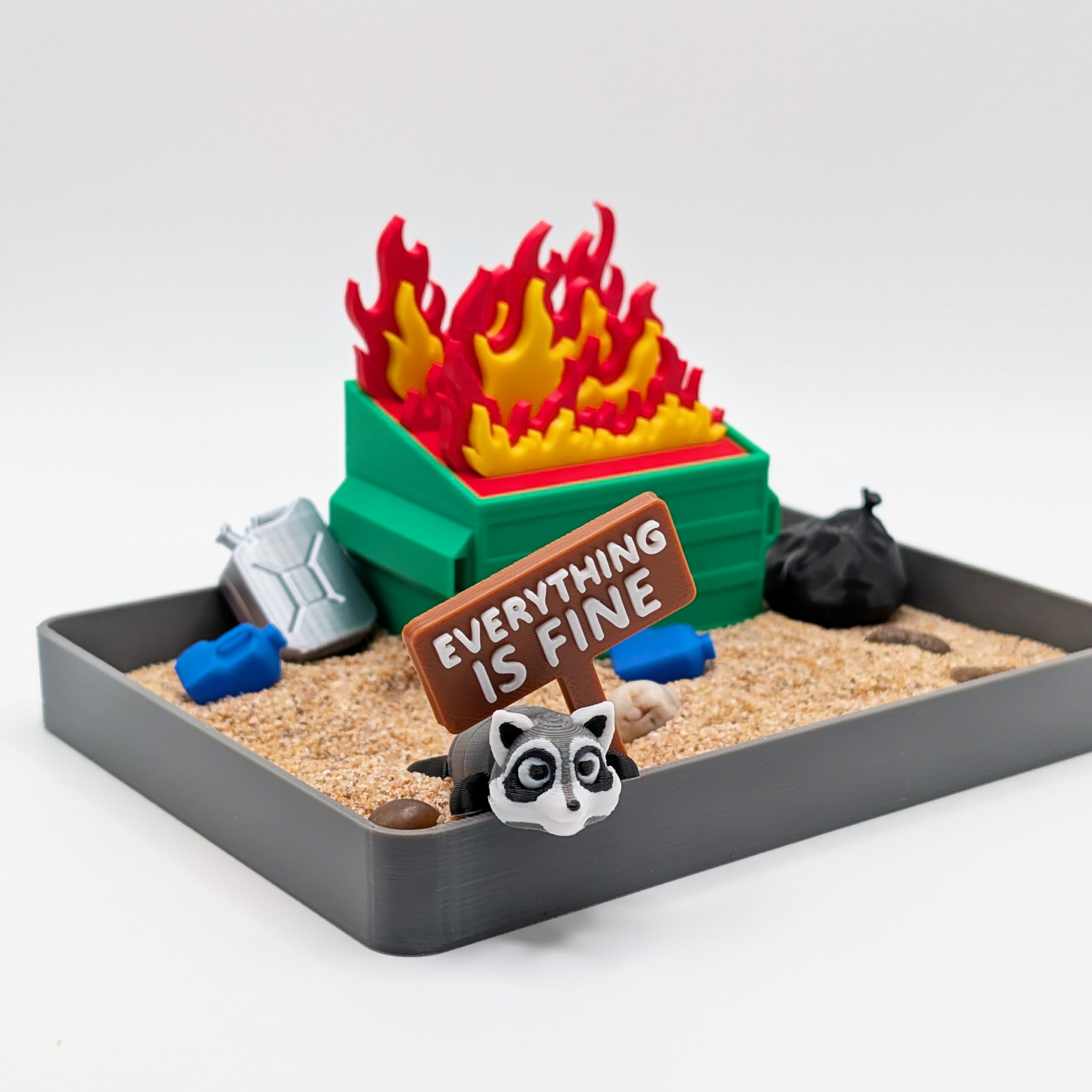 UglaForge Dumpster Fire Zen Garden closeup, handcrafted decor for desk mindfulness.