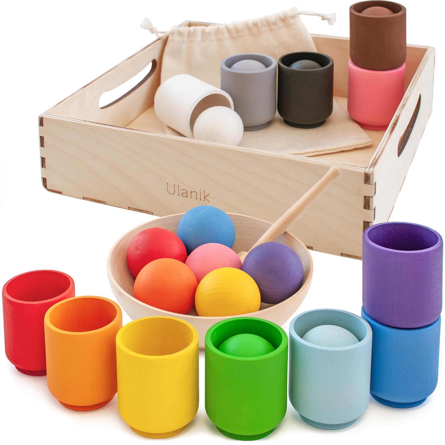 Ulanik large balls in cups—toddlers explore sorting and counting.