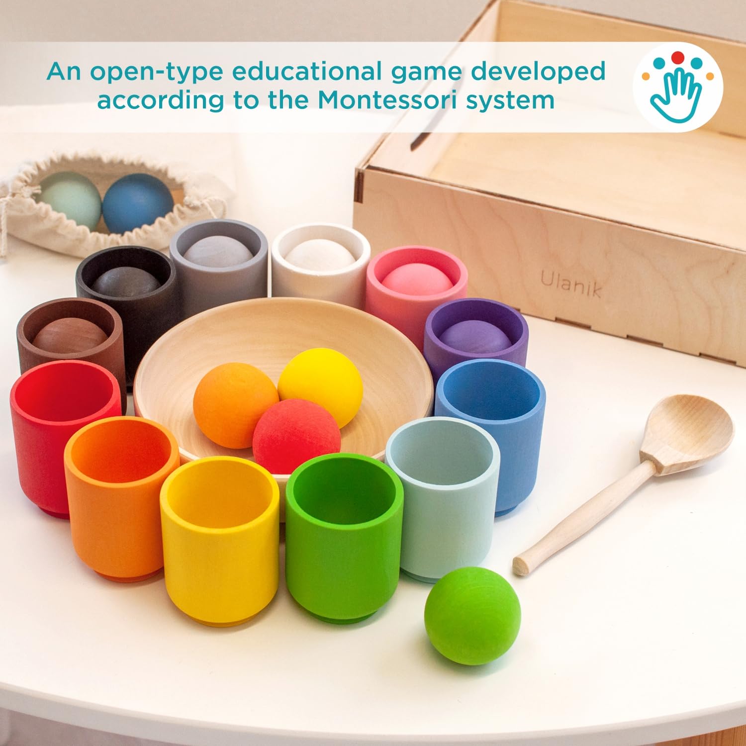 Ulanik Montessori tray keeps all cups and balls organized for play.