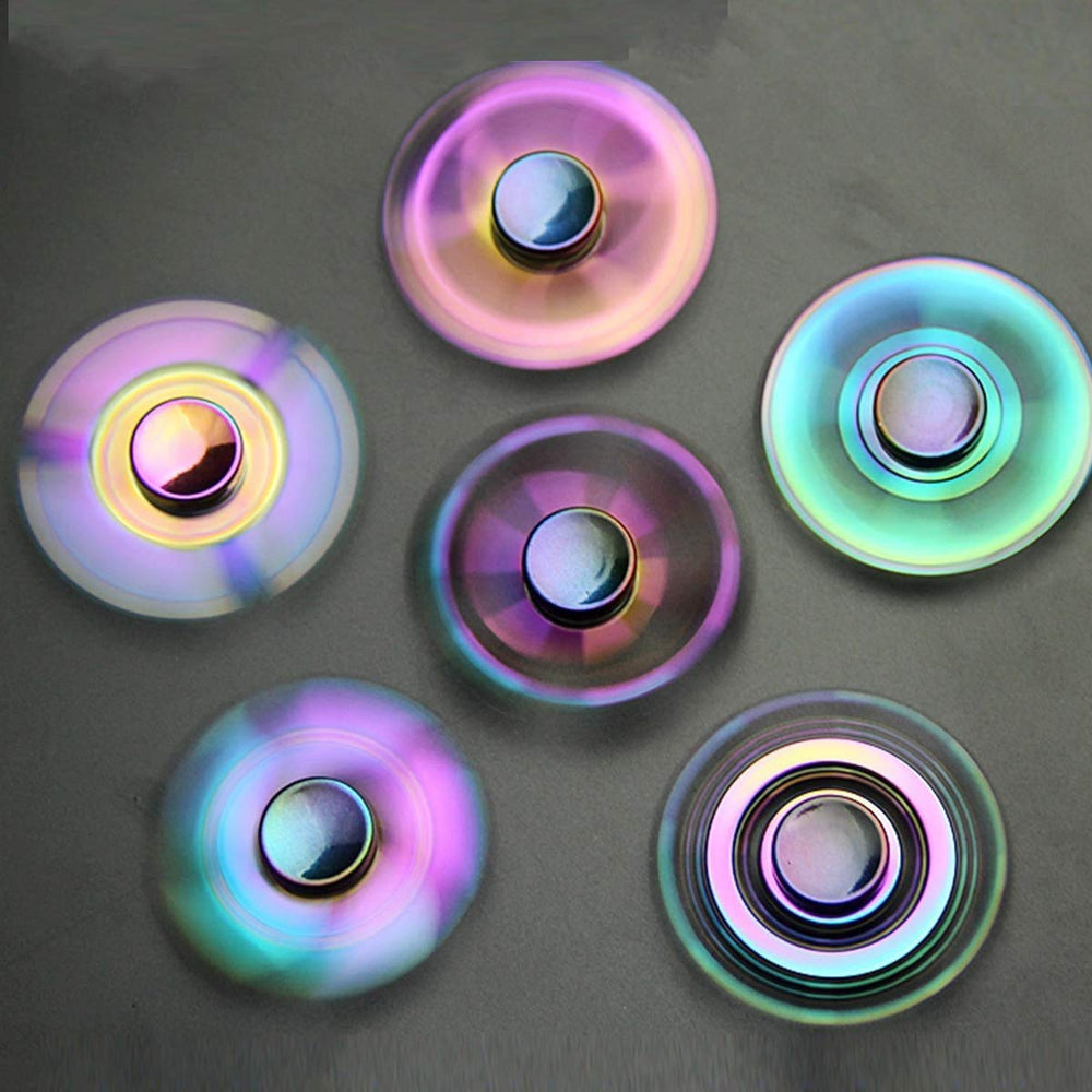 Umnodobn rainbow fidget spinner in green, pocket-sized desk buddy for concentration.