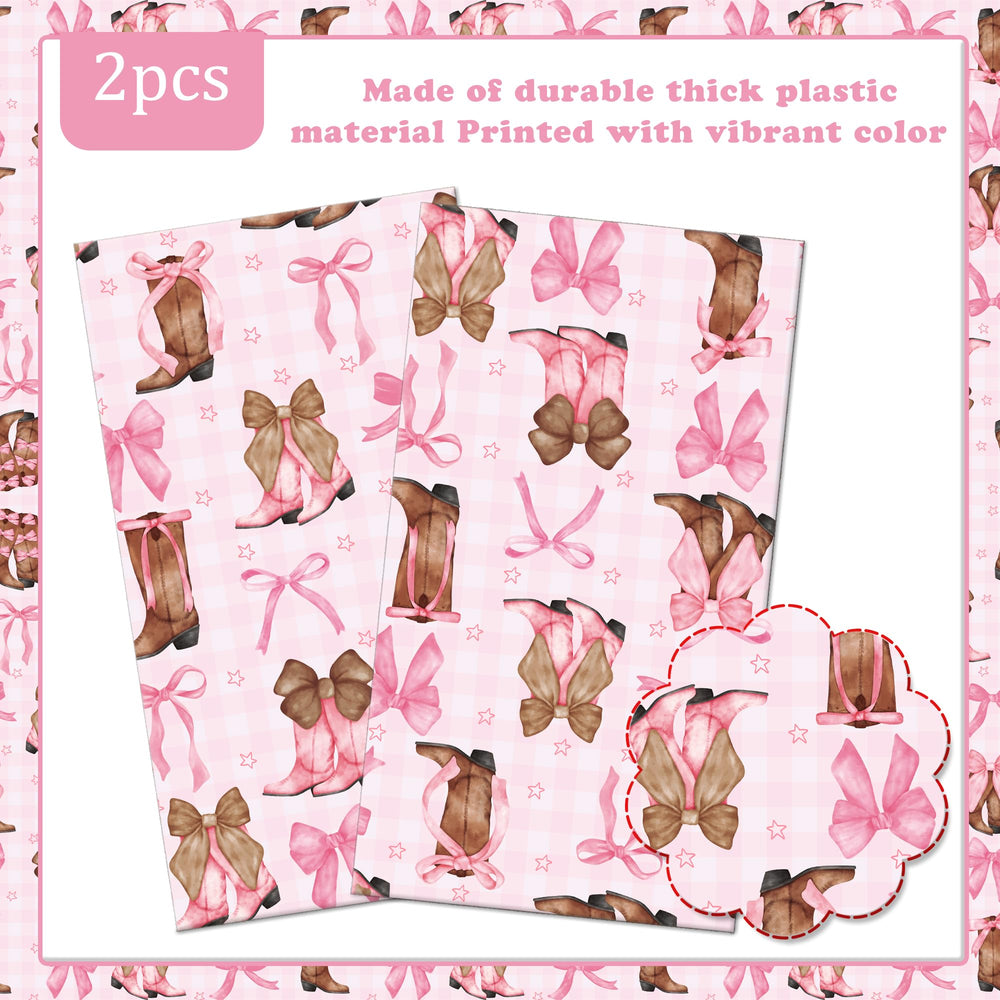 Umoni Coquette Cowgirl tablecloth on pink background with stars for easy event theming.