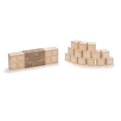 Uncle Goose natural blocks invite stacking, matching faces, and imaginative play on a shelf.