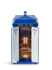 Illuminated lantern light flashes as the doors open, bringing the TARDIS to life.