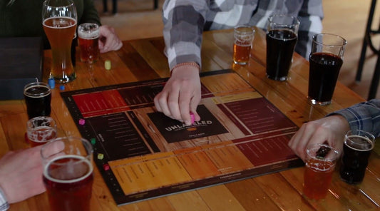 Unlabeled beer tasting game with friends enjoying a flight and discovering flavors.