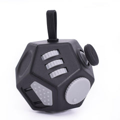 UOOEFUN mini fidget cube close-up, compact 12-sided design for focused use.