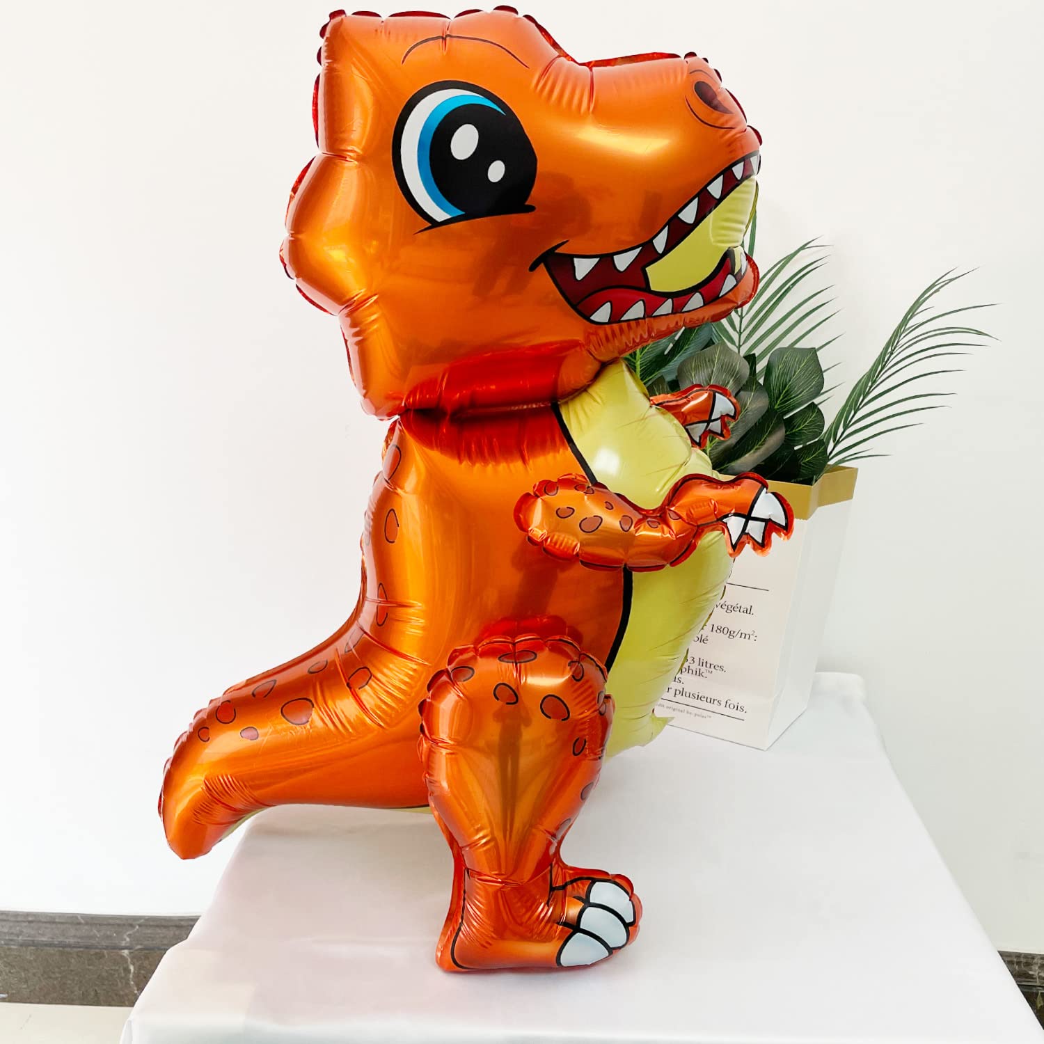 Uorbmaio Triceratops balloon stands out as a colorful party accent