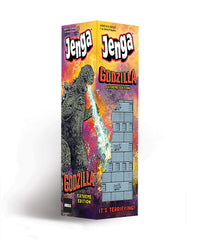 USAOPOLY Godzilla Extreme Edition tower under attack during dramatic gameplay.