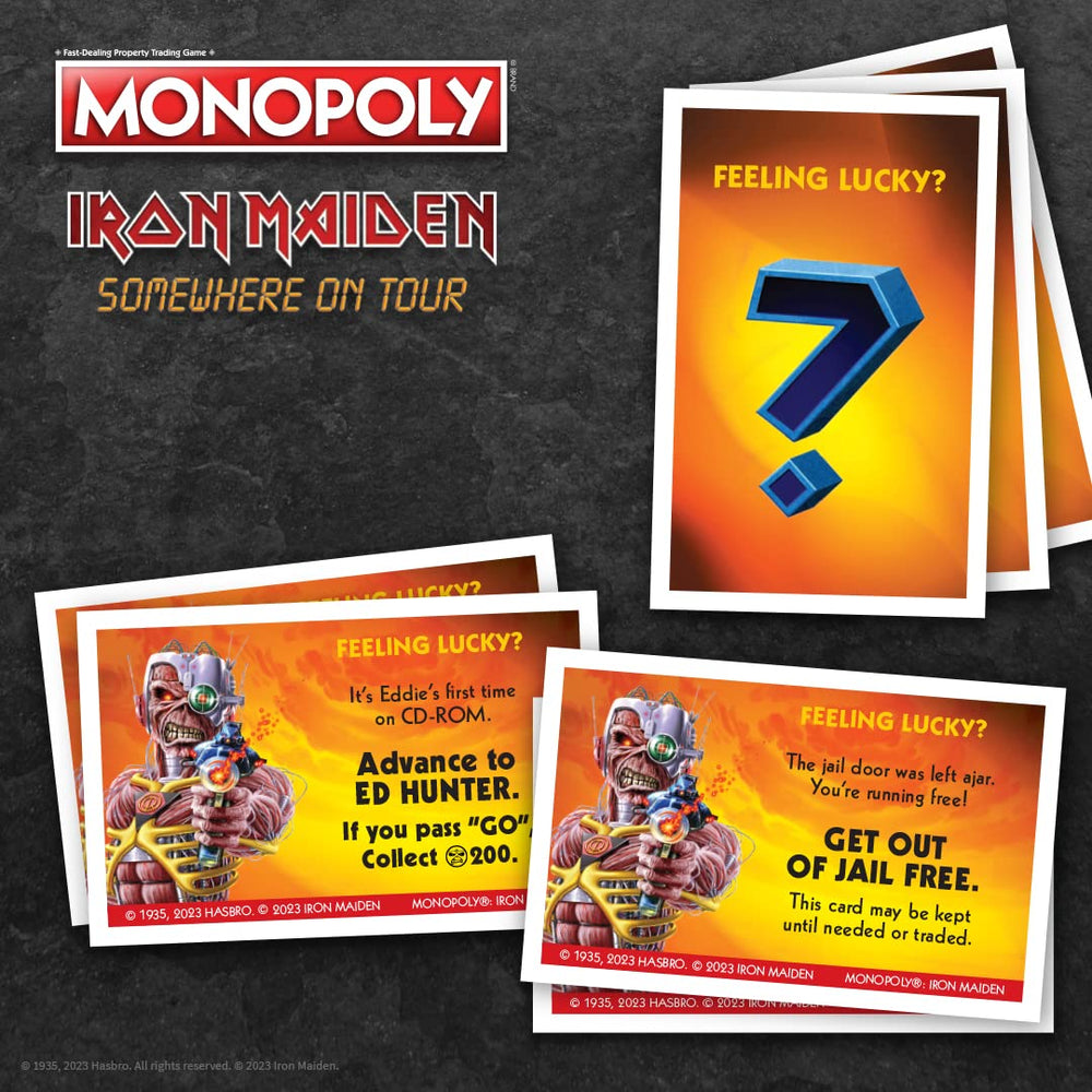 USAOPOLY Monopoly Iron Maiden box, money, and dice set ready to play.