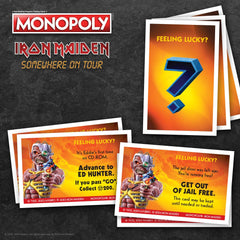 USAOPOLY Monopoly Iron Maiden box, money, and dice set ready to play.