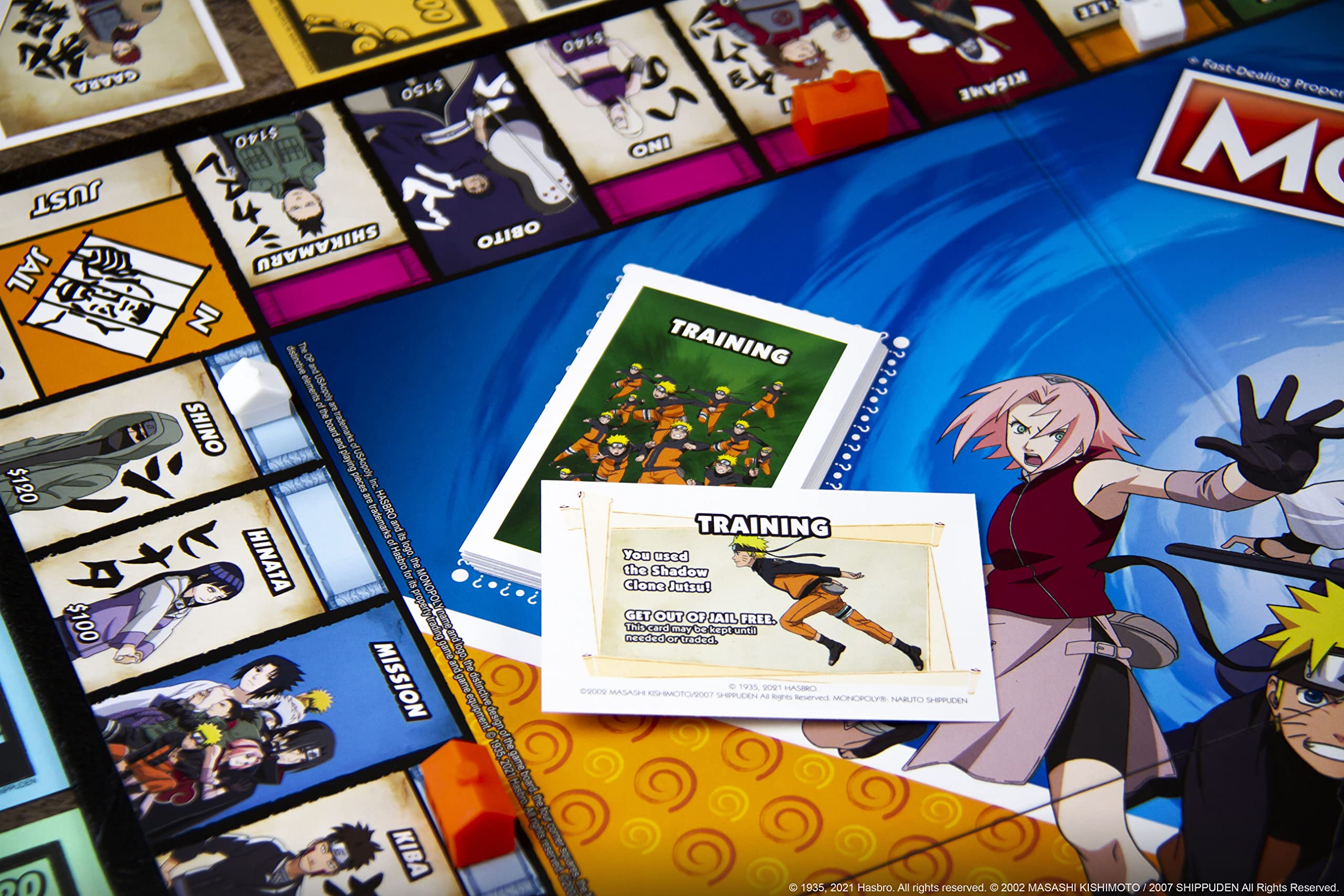 USAOPOLY Naruto Monopoly ramen bowls as hotels for themed upgrading choices.