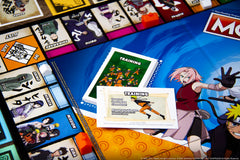 USAOPOLY Naruto Monopoly ramen bowls as hotels for themed upgrading choices.