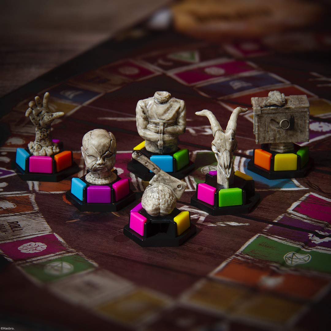 USAOPOLY Trivial Pursuit Horror Ultimate Edition Wedges and Rulebook organize the game.