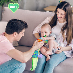 Ussybaby crocodile caterpillar toy shown during tummy time play