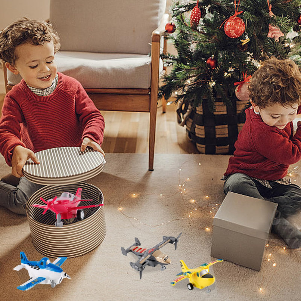 UXRPTU kids playing with pull-back planes boosts tactile play