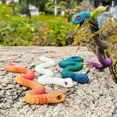 uyrzwek snake toy used as desk decor and conversation starter