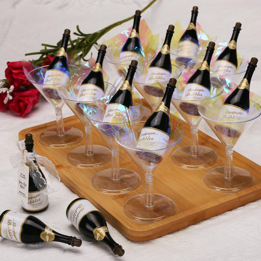 Uzoxlsn champagne bottle bubble wands decorating reception tables with sparkle.