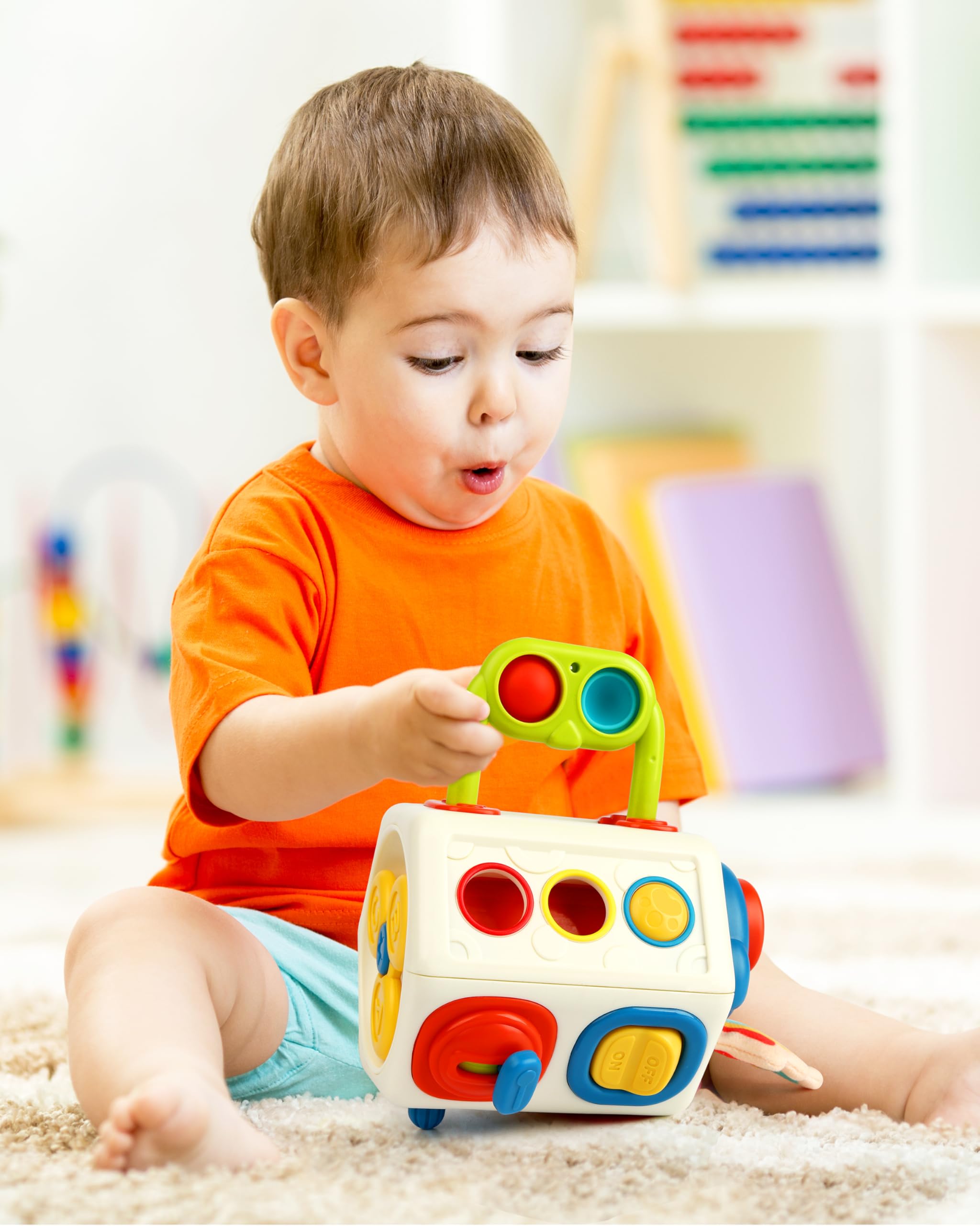 Vanmor Busy Cube pull-handle with bubble offers soothing travel play.
