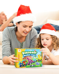 Vanmor toddler playing with the dinosaur-train setup during learning activity.