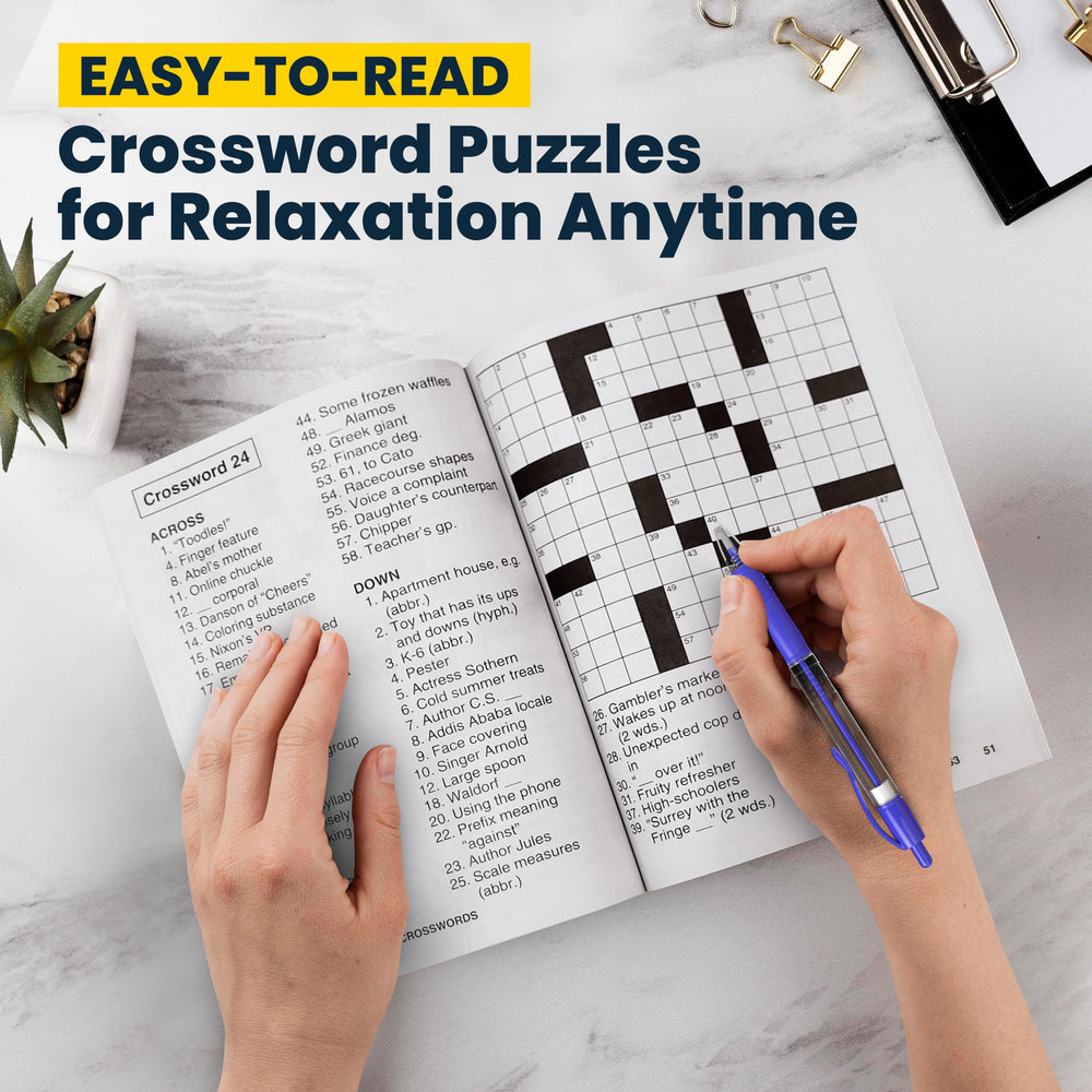 Open crossword pages with bold print from Variety Savings for seniors