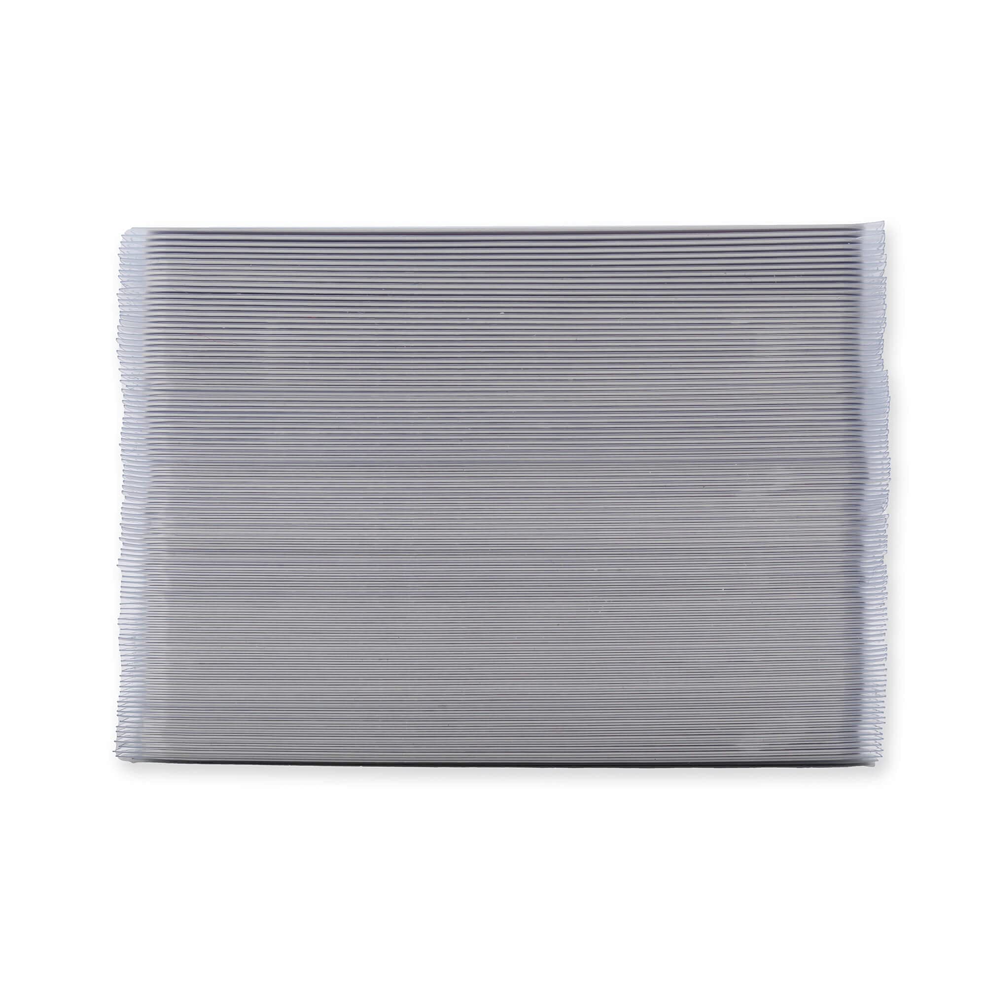 Vault X sleeves on a desk with a deck and tools showing organized protection