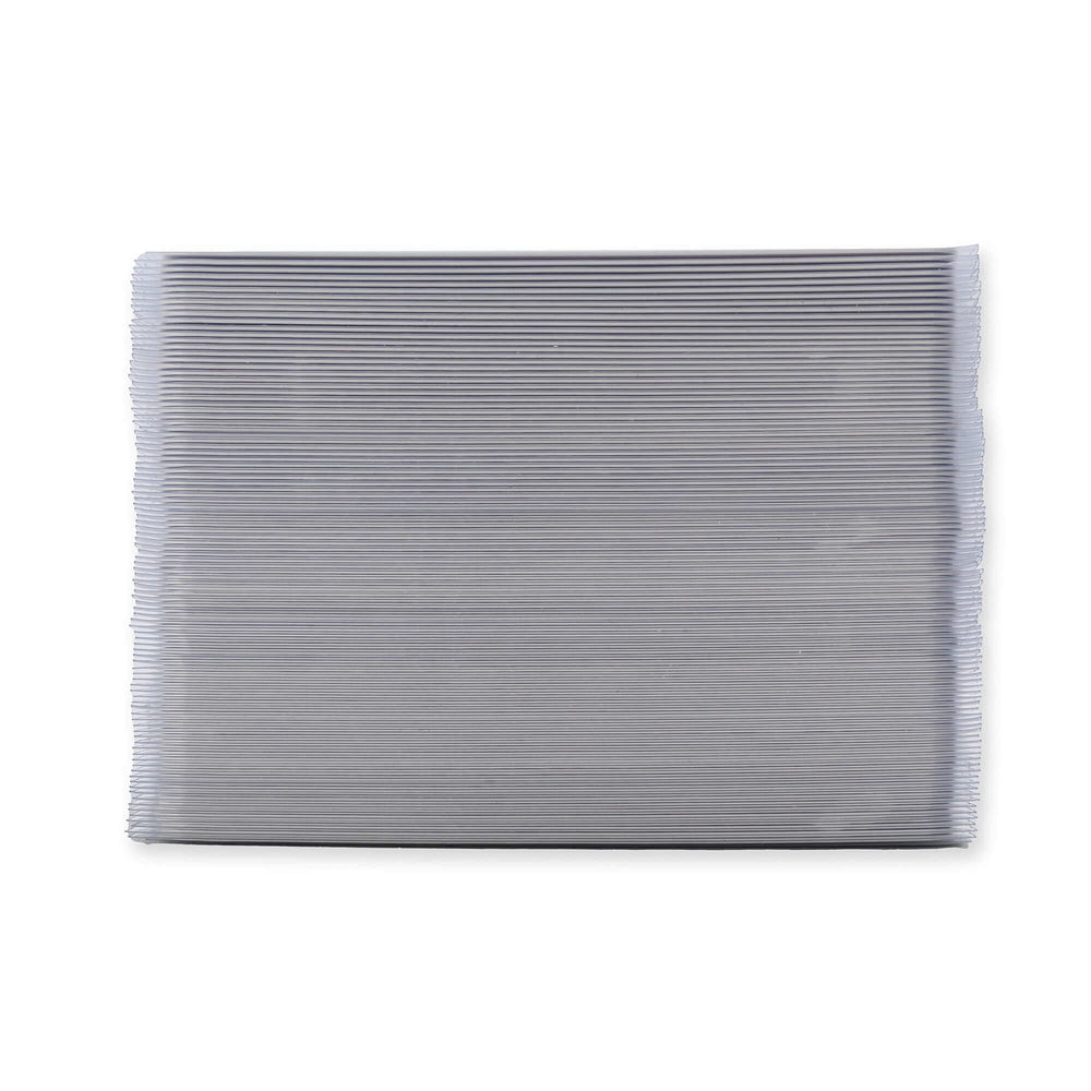 Vault X sleeves on a desk with a deck and tools showing organized protection