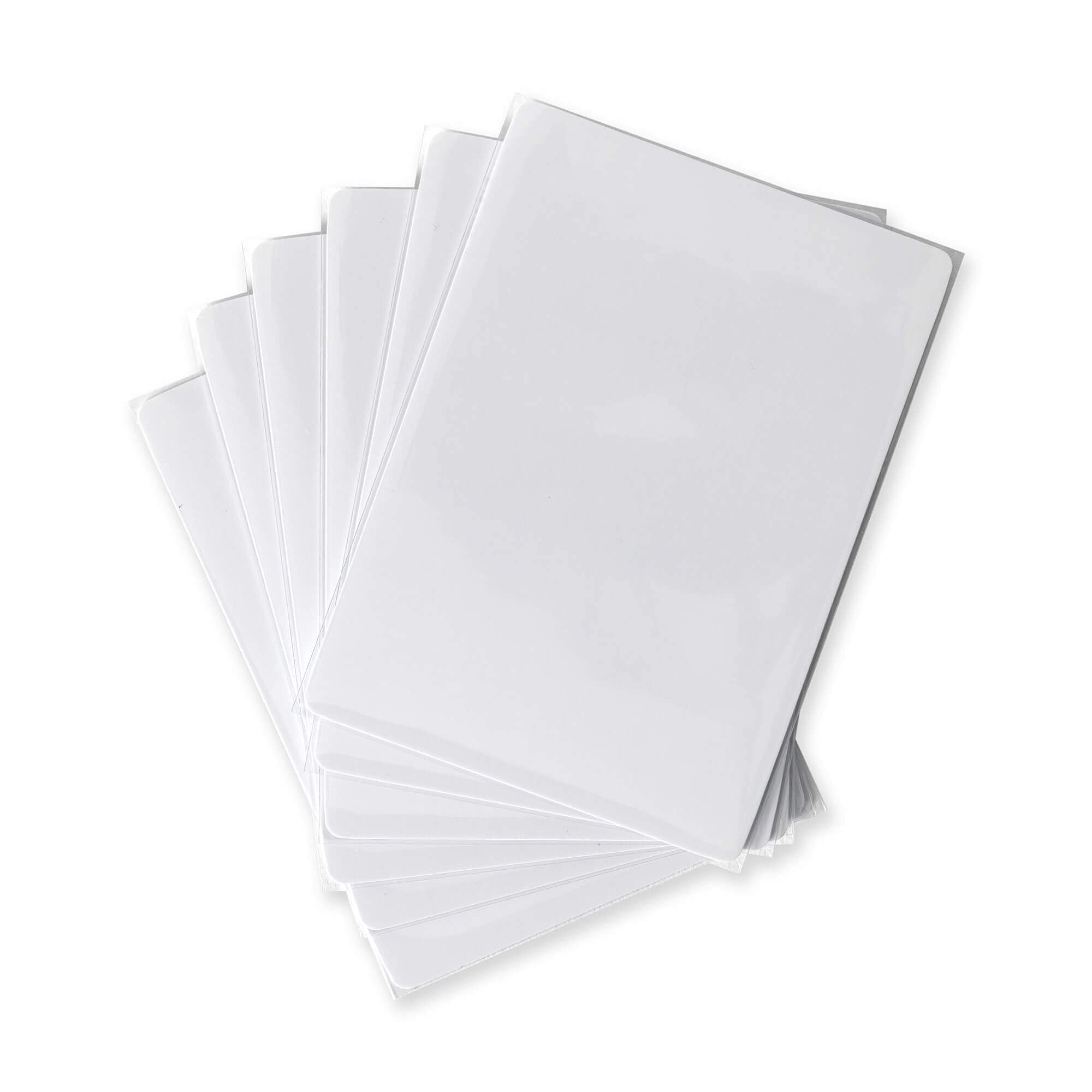 Vault X sleeves beside ruler illustrating 64mm x 89mm size accuracy