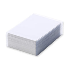 Vault X sleeve next to a standard card illustrating correct 66x92mm fit