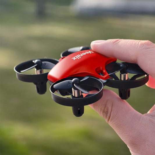 Veeniix V995 red mini drone front view for indoor fun and beginner control.