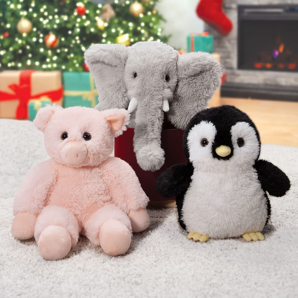 Product image of the 18-inch elephant on a cozy display shelf.