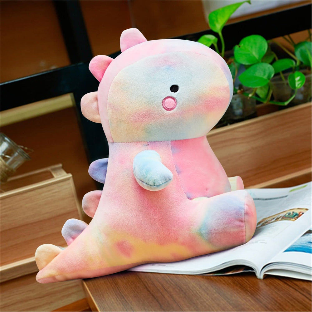 VHYHCY soft dino plush lying on bed invites cozy bedtime snuggles.