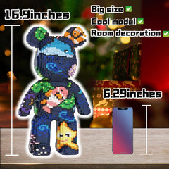 Close-up shows vibrant graffiti detail on the VIIOVOIIV teddy bear.
