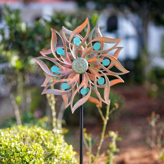 Viveta wind spinner with green beads adds motion and color to outdoor spaces