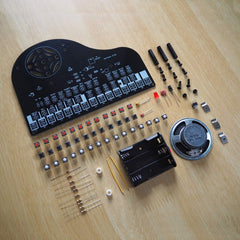 VOGURTIME DIY Piano Solder Kit close-up of keys and labeled pads for guided soldering