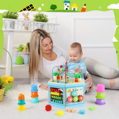 Vomocent cube sliding animals encourages hand dexterity and color recognition.