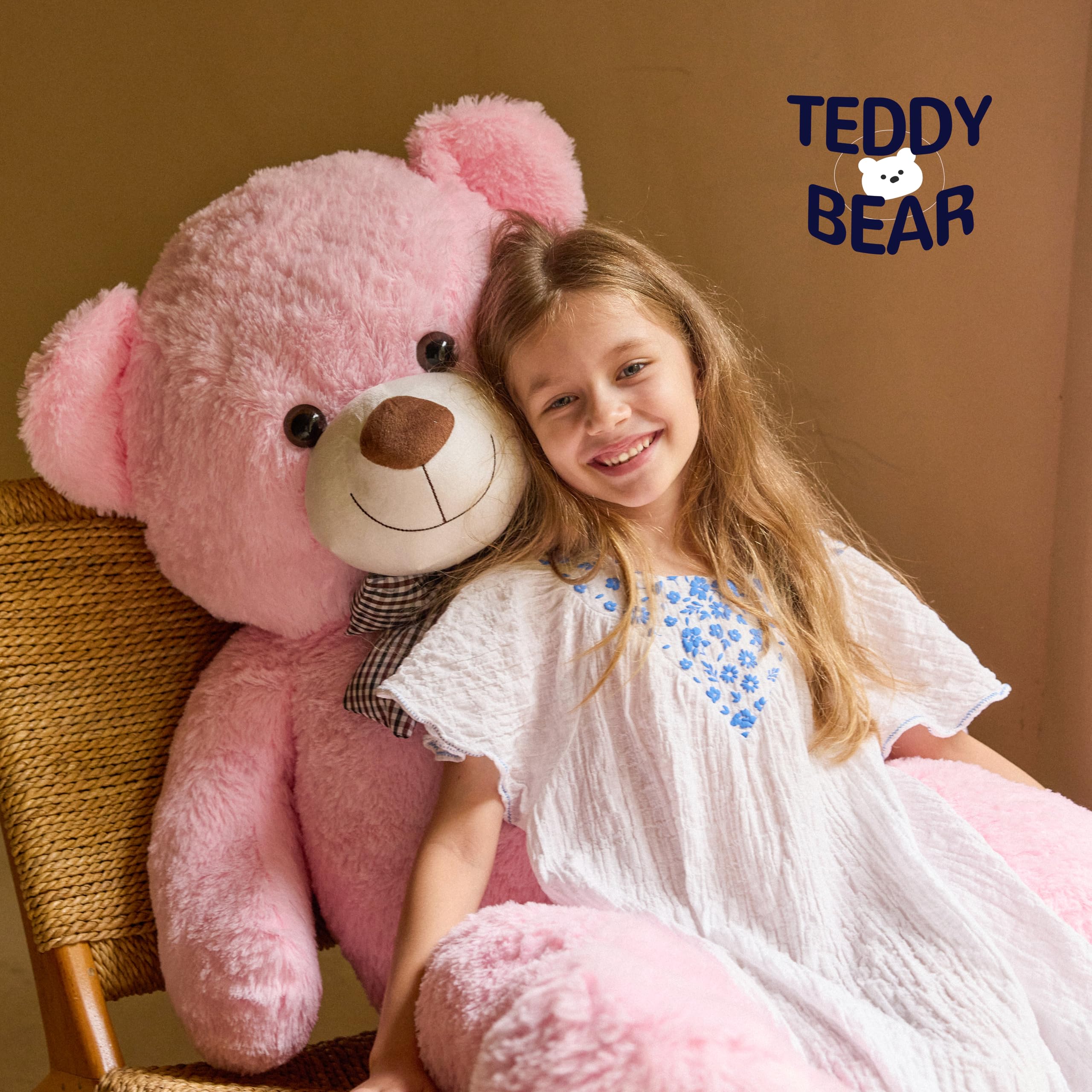 Soft plush texture of Vposyako pink teddy bear for gentle hugs