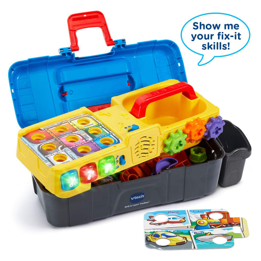 VTech Drill and Learn Toolbox drill in action spinning gears and drilling into the electronic tray.