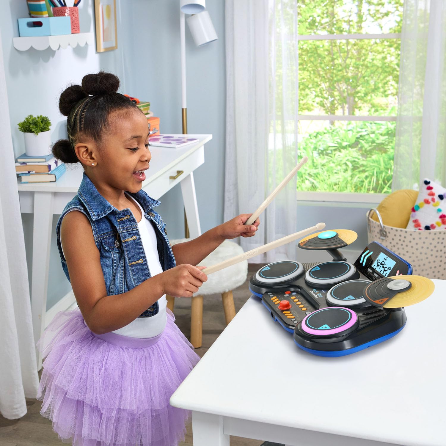 VTech Kidi Star Drum Pad black three games for varied practice.
