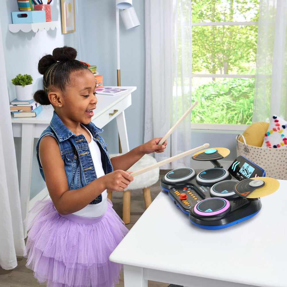 VTech Kidi Star Drum Pad black three games for varied practice.