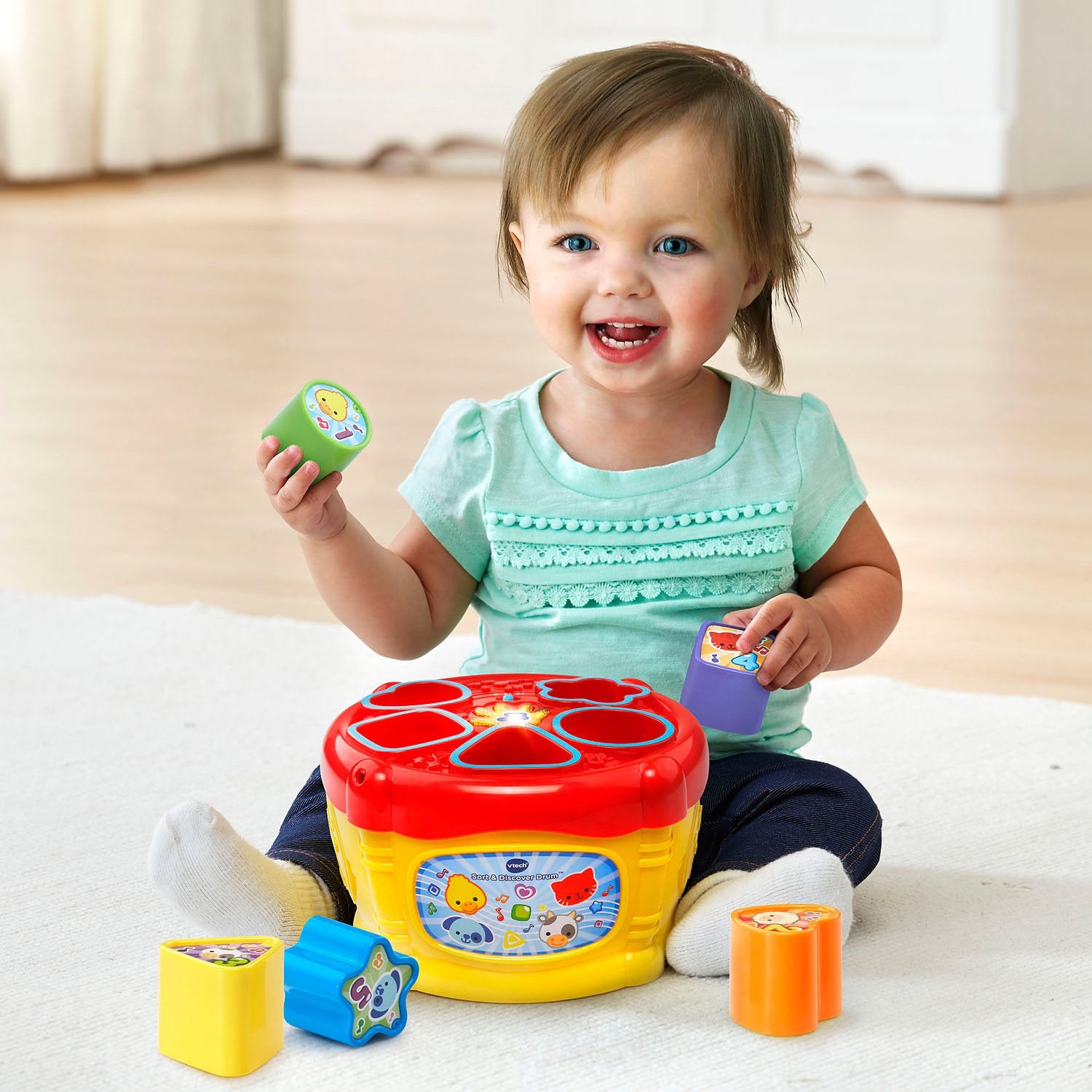 VTech Sort and Discover Drum suitable for ages 6–36 months during early play.