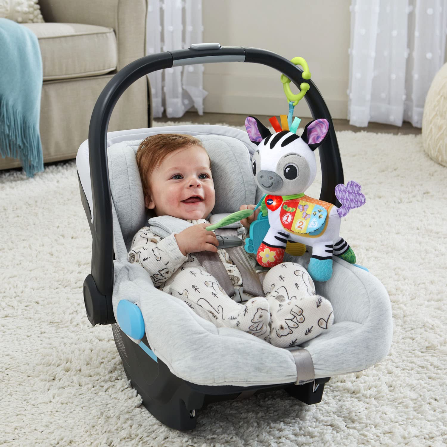 VTech Take Me With You Zebra peek-a-boo buttons teach colors and numbers.