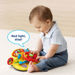 VTech Turn and Learn Driver features red, yellow, and green lights for learning simple concepts.