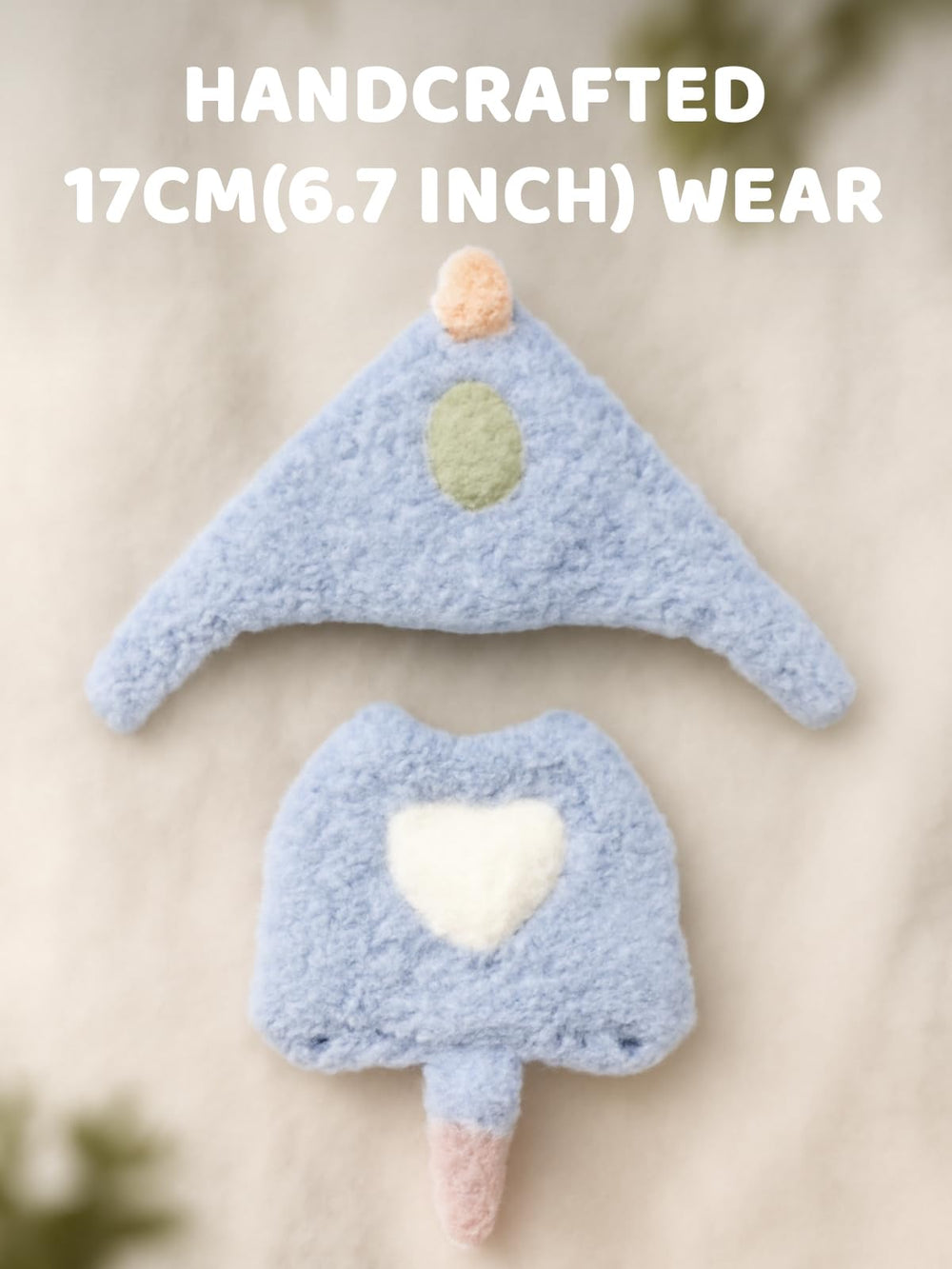 VVQUI dino doll accessory keychain ensemble in light blue for display.