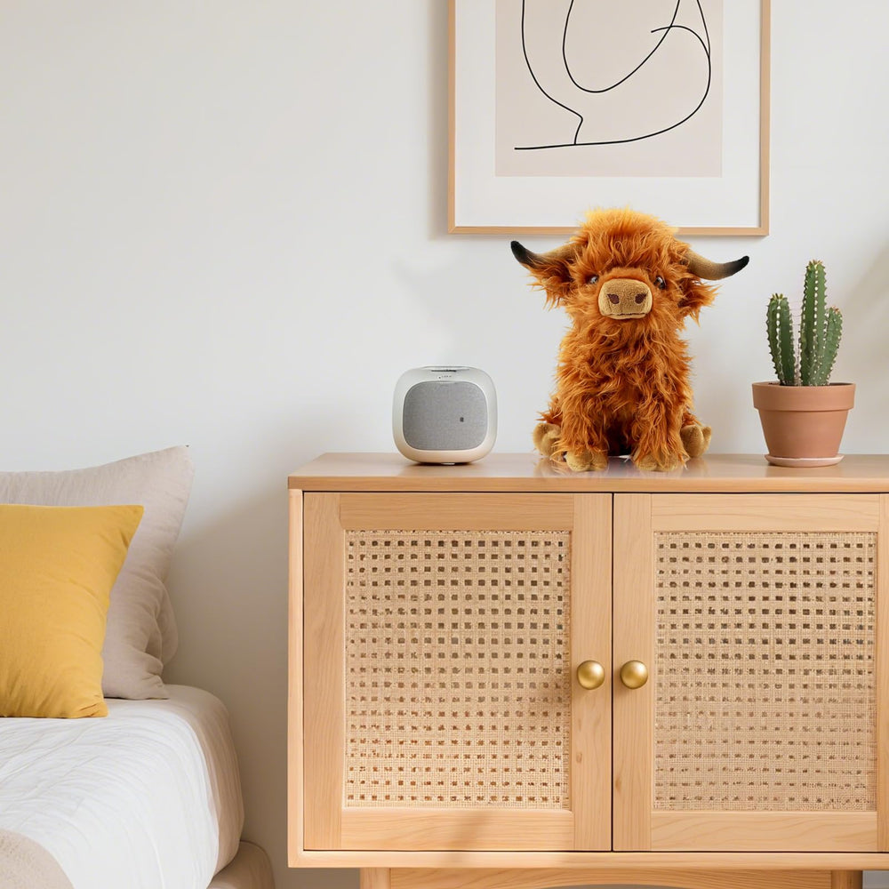 VYRNARA Highland Cow plush with detailed fur texture for realistic appeal.