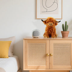 VYRNARA Highland Cow plush with detailed fur texture for realistic appeal.