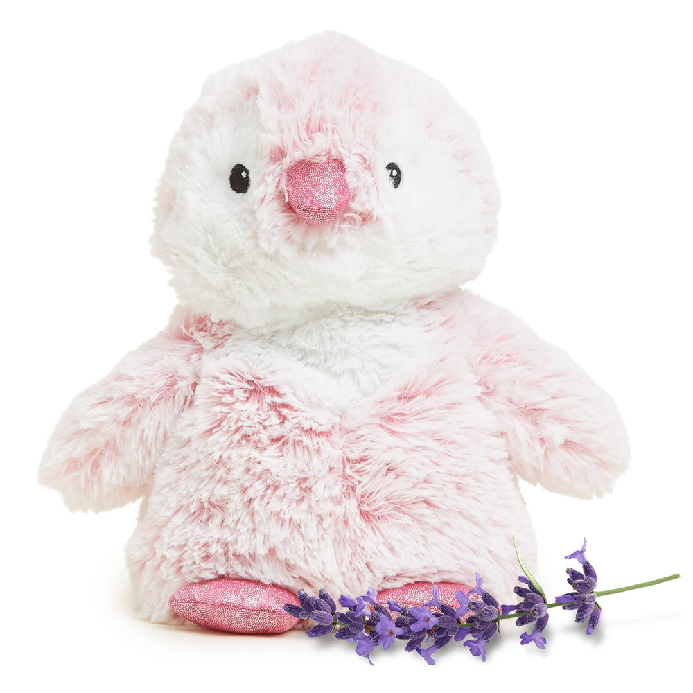 Warmies Pink Penguin ready for soothing warmth after a long day.